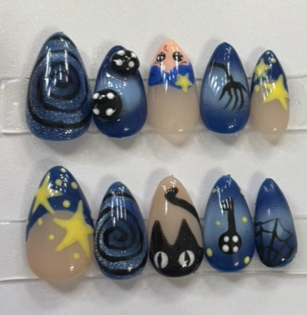 Dark blue midnight sky cat nails with stars and moon