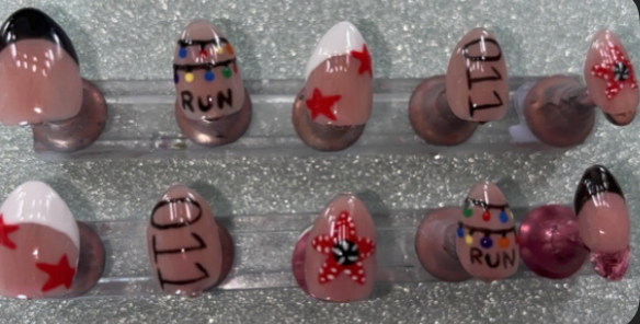 Christmas light and red star nails with lettering